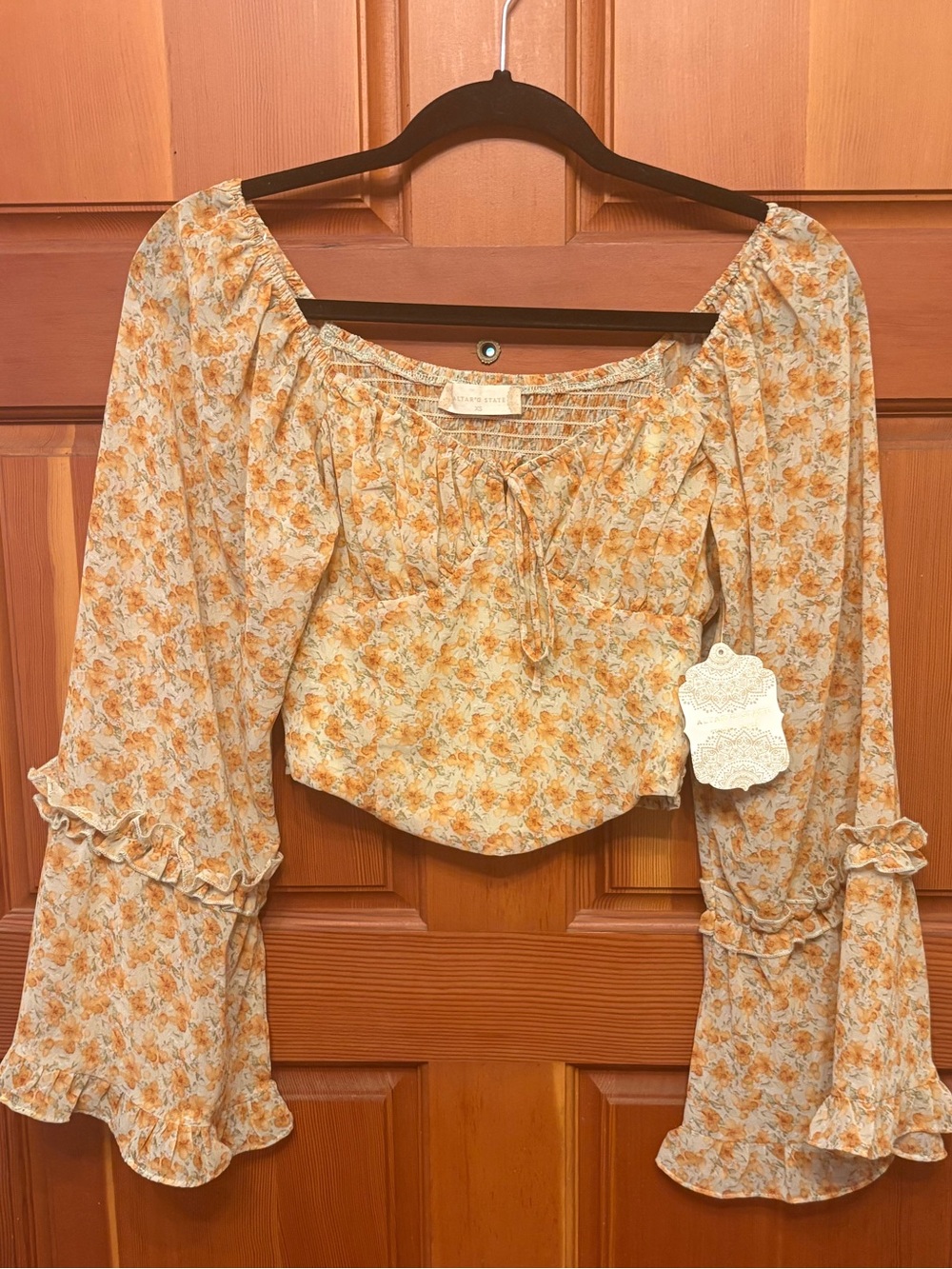 Altar'd State Orange Floral Smocked Peasant Top